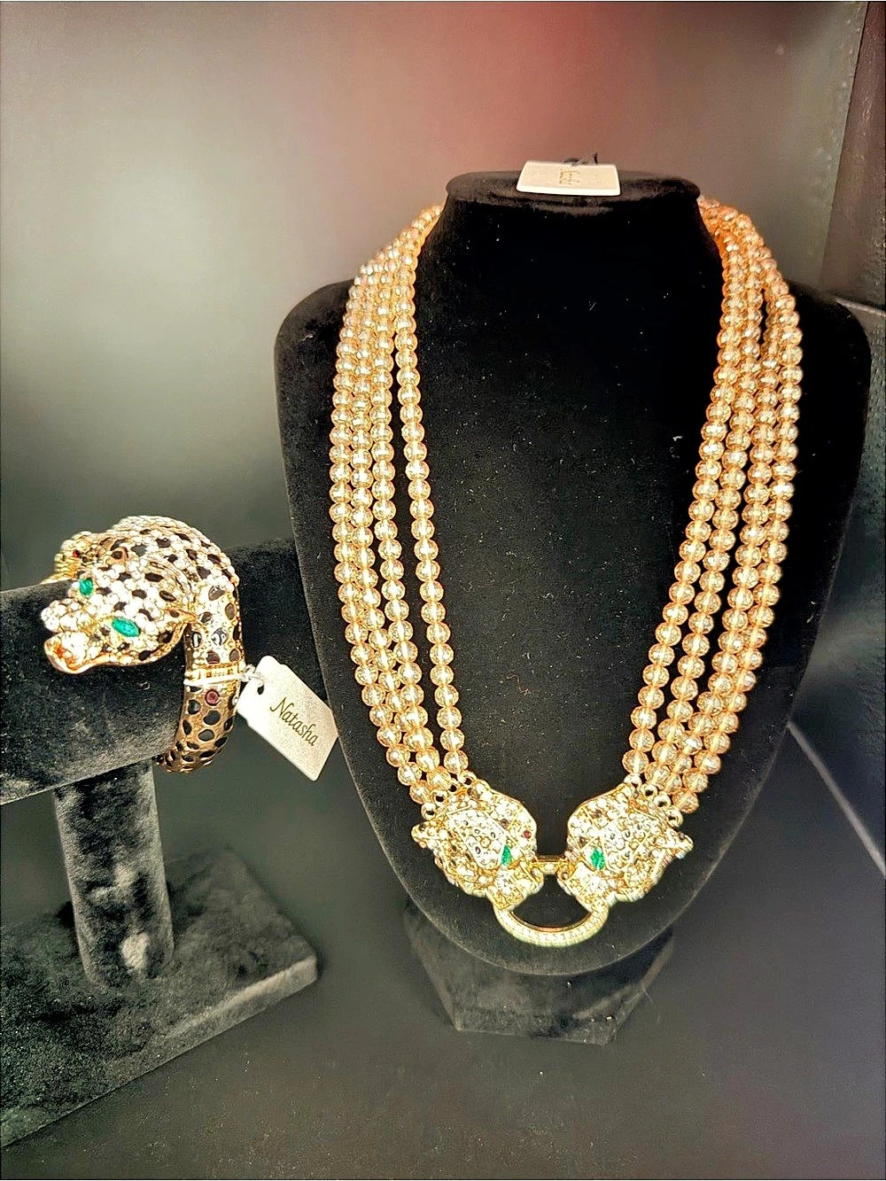 Natori Crystal Panther Multi-Strand Necklace and matching cuff bracelet with hin